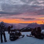 Balade en motoneige au couché du soleil, station Les Saisies (France)